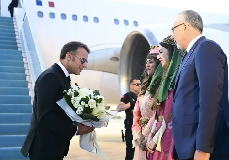 Macron i turski ministar Vedat Isikhan  nato samit
