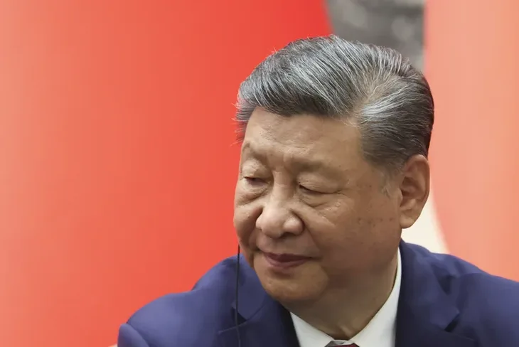 Xi