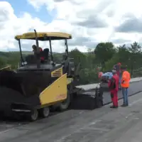 Most na Sani u Čaplju- Stavljanje prvog sloja asvalt