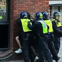 Velika Britanija neredi muslimani