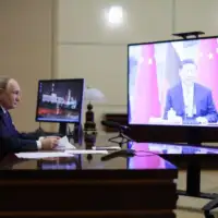 Vladimir Putin i Si D Jinping 872x610