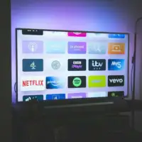 T V