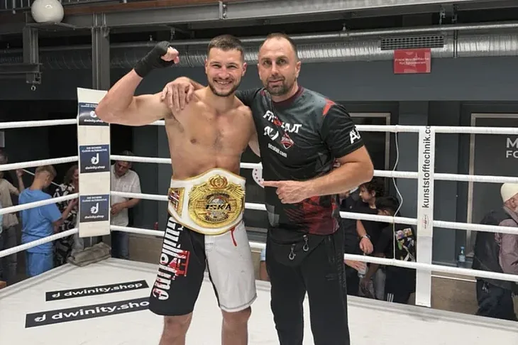 Albert Ugrincic s trenerom Nerminom Basovicem