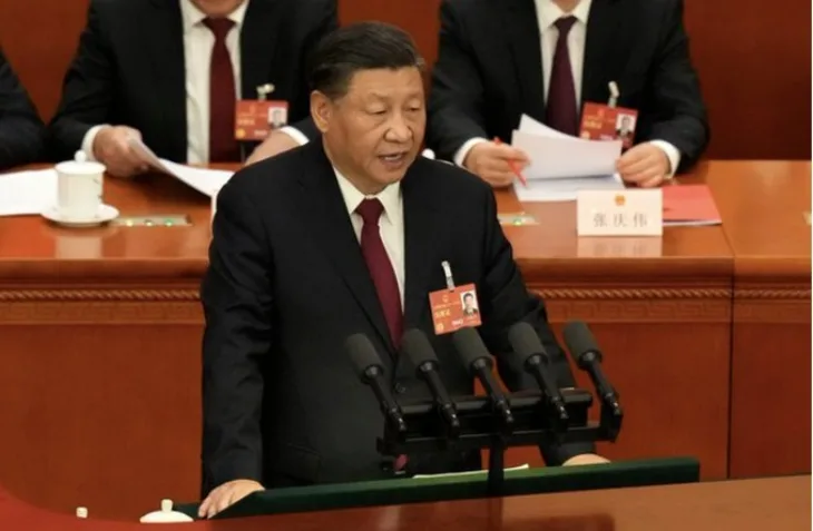 Xi