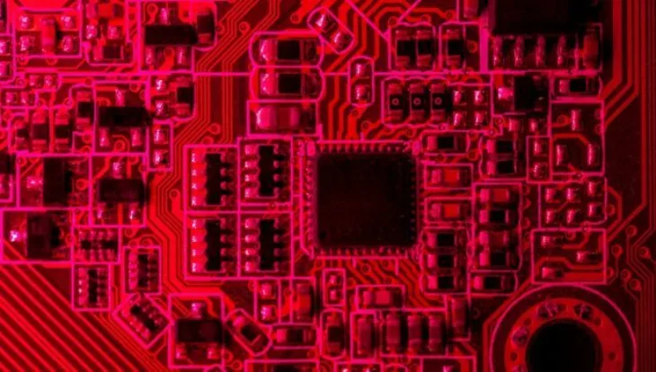 Red themed circuit board with chip close up 1 640x363