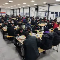 AA 20230406 30784738 30784731 BIH ORGANIZOVAN IFTAR ZA MIGRANTE U PPCU LIPA KOD BIHACA